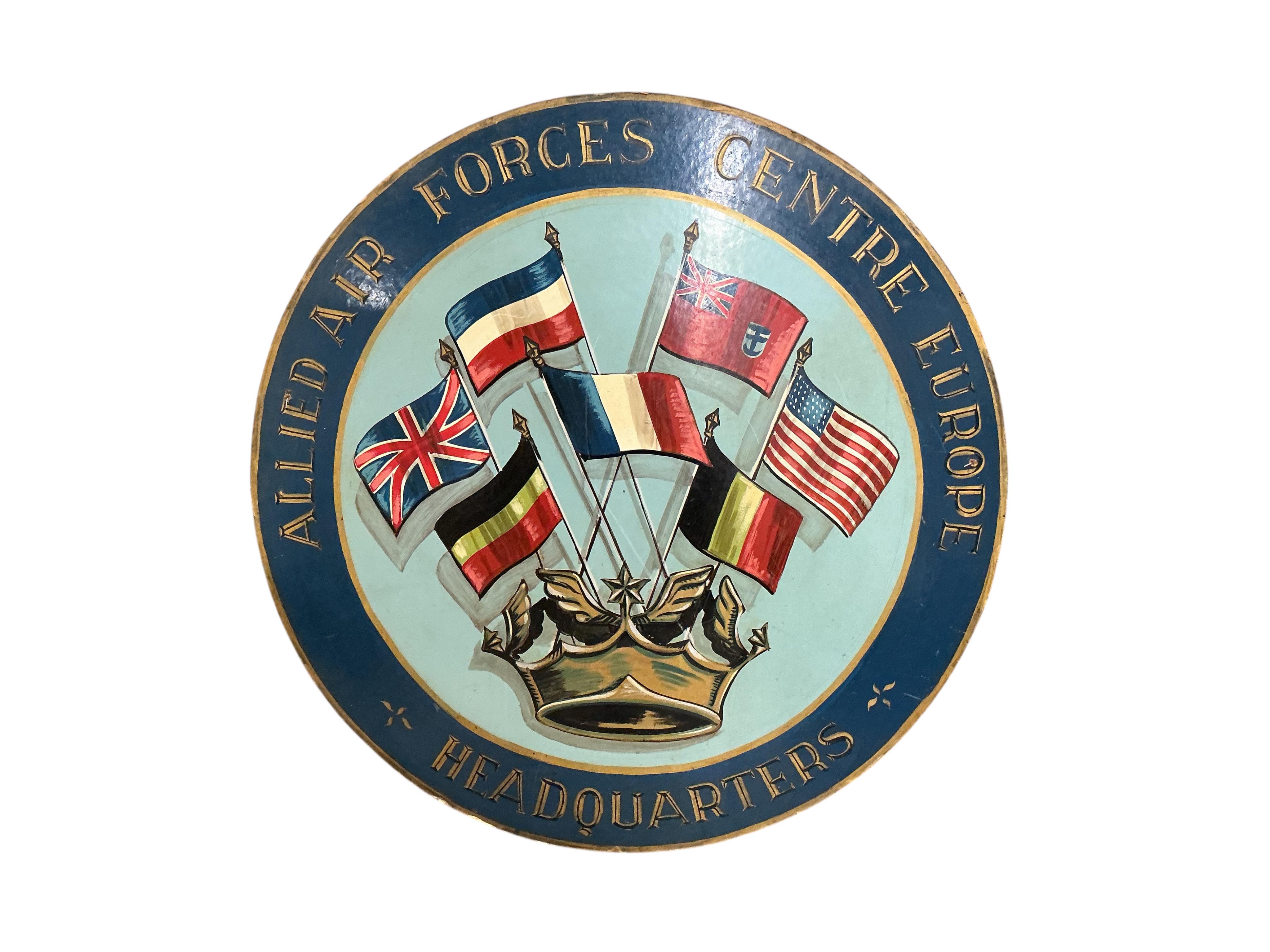 A circular painted Allied Air Forces Centre Europe sign, diameter 120cm